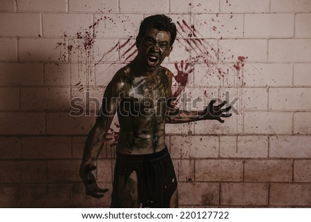 Ugly Zombie man in haunted house