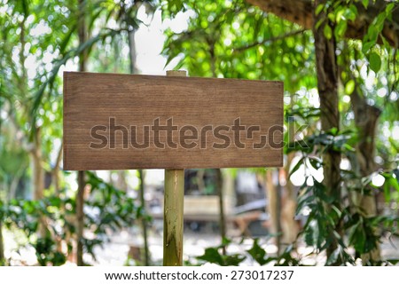 empty wooden sign on wood fence