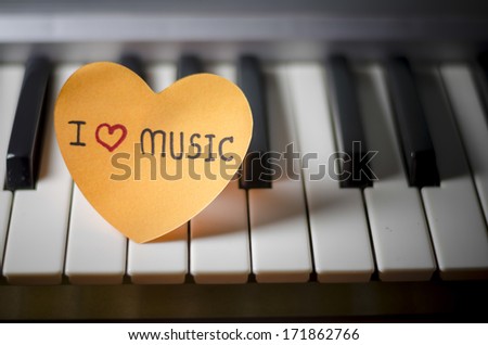heart on key piano say love music