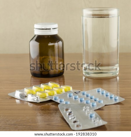 many pills to eat with water drinking concept time to take care your self
