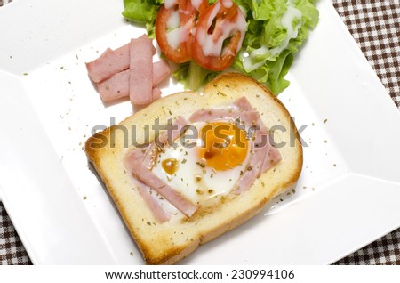 breakfast food menu egg in a hole with salad