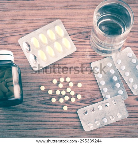 many pills to eat with water drinking concept time to take care your self vintage style