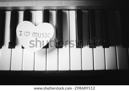 heart on key piano say love music black and white color tone style