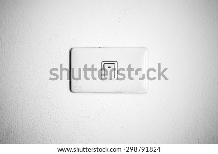 electric white switch on wall black and white color tone style
