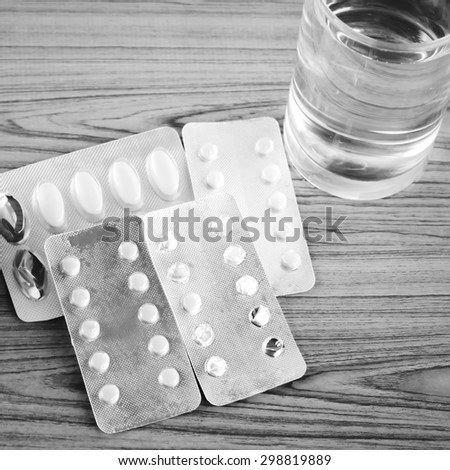 many pills to eat with water drinking concept time to take care your self black and white color tone style