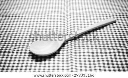 spoon wood on kitchen towel background black and white color tone style