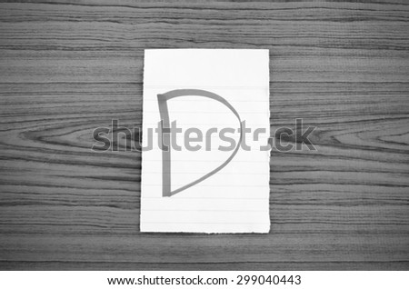 grade d on wood wall background black and white color tone style