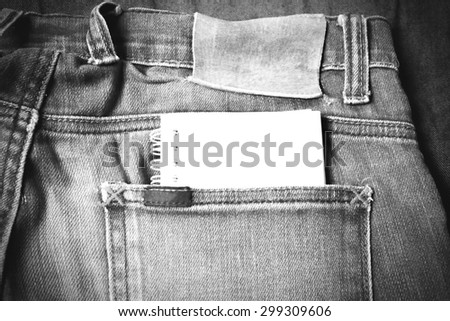 notebook paper in jean pocket pants black and white tone color style