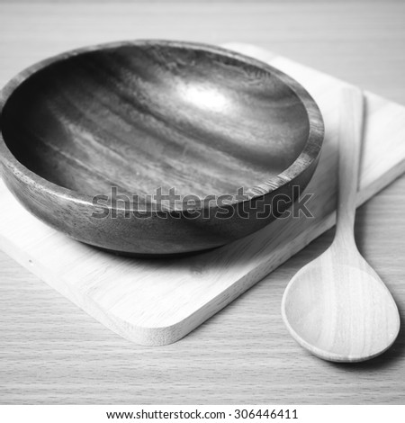 wood bowl and spoon on table background black and white color tone style