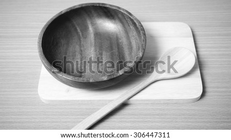 wood bowl and spoon on table background black and white color tone style