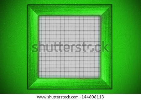 Wood frame with paper fill at green wall