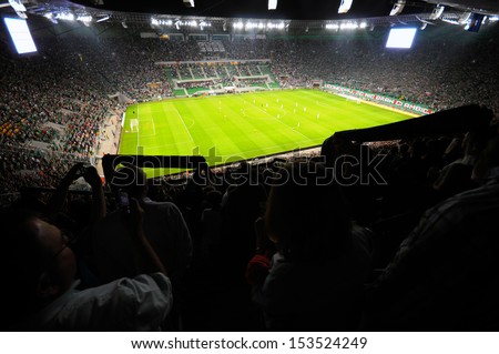 Wroclaw, Poland - August 29:Uefa Europa League, Stadium With Fans Silhouettes On Football Match, Slask Wroclaw Vs Sevilla On August 29, 2013 In Wroclaw, Poland.