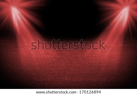 Red cold light soccer field, bright spotlights