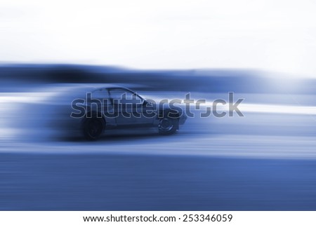 drift car motion blur in blue colour