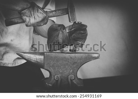 vintage photo Detail shot of metal being worked at a blacksmith forge