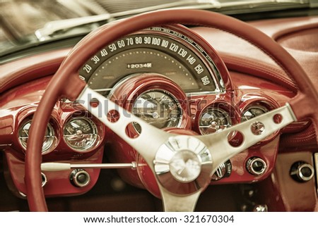 Sleza, Poland, August 15, 2015: Close up on Corvette vintage car steering wheel and kockpit on  Motorclassic show on August 15, 2015 in the Poland