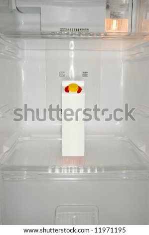 Milk carton inside a new refrigerator