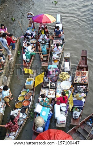 Ampawa Floating Market - April 12, 2008: The most famous floating market in Thailand sees as variety of Thai Traditional Food.