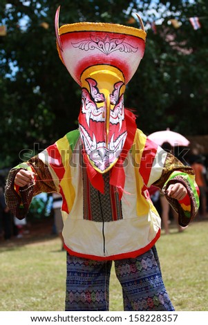 LOEI, THAILAND - JUNE 12, 2010: Ghost Festival (Phi Ta Khon) is a type of masked procession celebrated on Buddhist merit- making holiday known in Thai as\