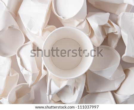 Empty Paper cup with crushed cups