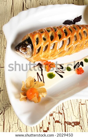Fish fired with bread and red caviar