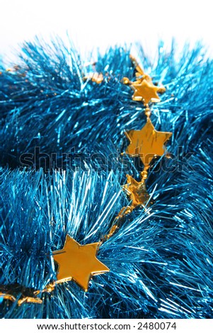 Christmas decoration yellow stars on blue rain