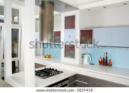 Modern white and wood kitchen interior shot with studio light