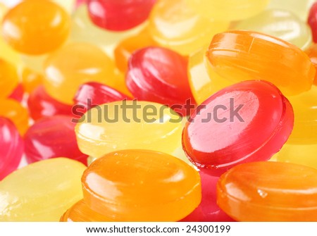 Color candy glass pill on white background
