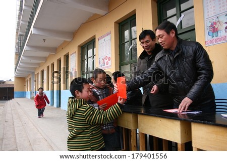 XINGTAI CITY, HEBEI PROVINCE, CHINA - MAR 2, 2012 In the March 2, 2012, a school for students winning awards and certificates. The award-winning unidentified students are very happy and proud.