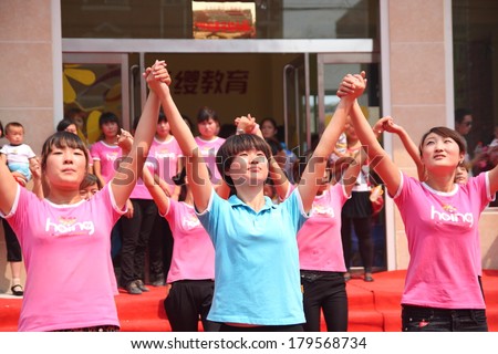 Xingtai City, Hebei Province, China - August 2012: In August 25, 2012, China baixiang County nursery opened. It is unknown teacher identity in performances.