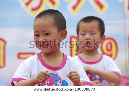 Baixiang County, China -June 2011: June 1, 2011, baixiang county party organized to celebrate International Children\'s Day. Unidentified children on stage is very cute, and some laughs and some tears.
