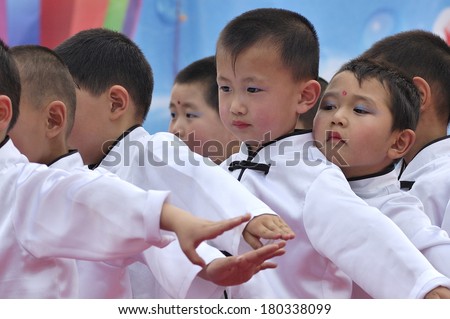 Baixiang County, China -June 2011: June 1, 2011, baixiang county party organized to celebrate International Children\'s Day. Unidentified children on stage is very cute, and some laughs and some tears.