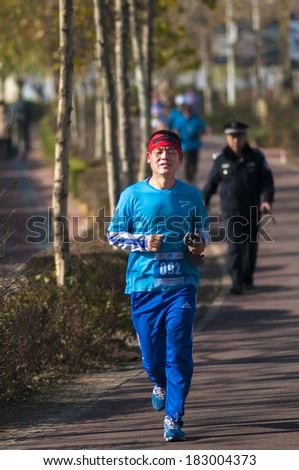 Xingtai City, China in November 2013: On November 17, 2013, Xingtai City held the first marathon. Around the country more than 400 different ages Mingmalasong players participated in the tournament.