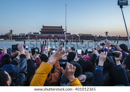 Beijing, China - March 26: March 26, 2016, unidentified people waiting flag-raising ceremony in Beijing\'s Tiananmen Square, and take pictures.