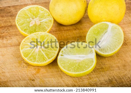 group of lemon isolated on wood