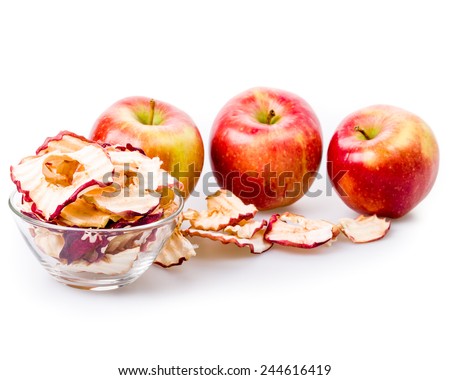 Apple chips with fresh apples on white underground isolated