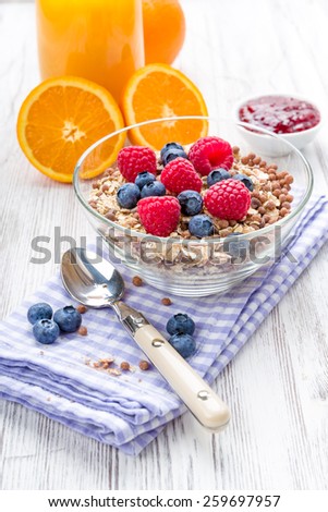 Muesli with fresh fruit on a breakfast table