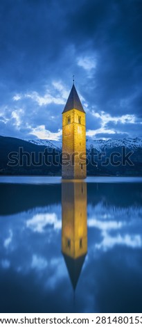 golden flooded church in the lake in Italy