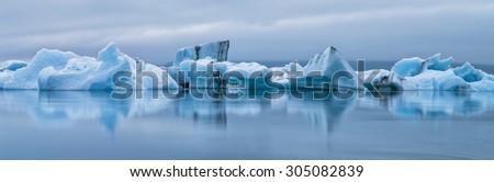 floated icebergs in valley of icebergs in twilights in Iceland