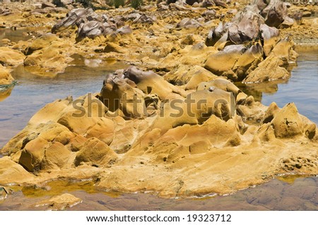 Polluted river by contaminated water of a mine runoff