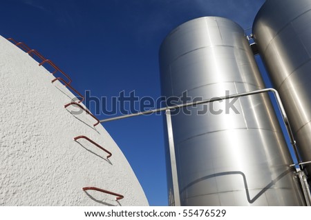 Stainless steel and concrete tanks in a winery, Alentejo, Portugal