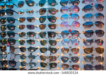 TACHILEIK - AUGUST 3, 2013 : Counterfeit goods of RayBan sunglasses in black market  in Tachileik, Burma.