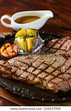 hot pan grilled beef T bone steak