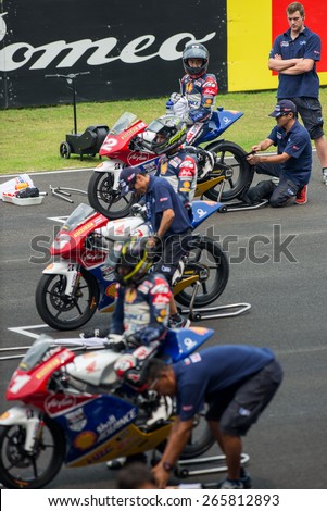 BURIRAM - MARCH 21 :  Shell Advance Asia Talent Cup riders on grid track at Chang International Circuit on March 21 2015, Thailand