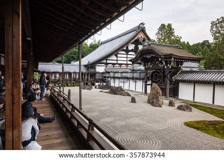 KYOTO - JAPAN, November 7 : Tourists relaxing while looking zen stone garden in Tofukuji temple in Kyoto, Japan on November 7, 2015