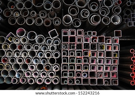 Stack of iron pipes in an iron shop