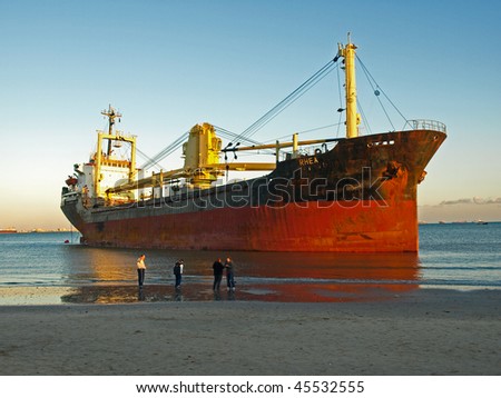 ALGECIRAS, SPAIN - JANUARY 29: Cargo ship got stuck on the beach of Algeciras, in Algeciras, Andalusia, Spain, January 29, 2010. Ship accidents happen often when the weather is stormy.