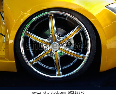 close up of a chromed wheel of tuned car
