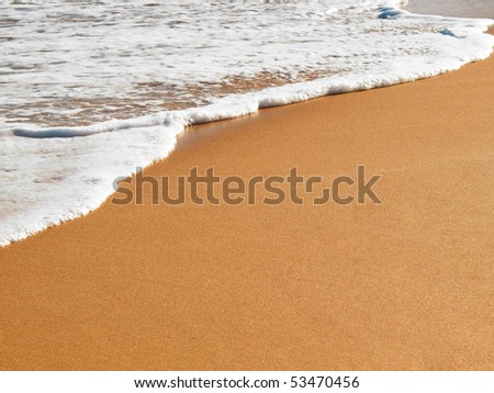 gentle waves on the beach with copy space