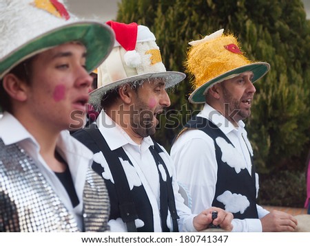 ALGECIRAS, SPAIN - MARCH 08, 2014: A disguised group of men celebrating the Carnivals festivities in Algeciras, Cadiz, Andalusia
